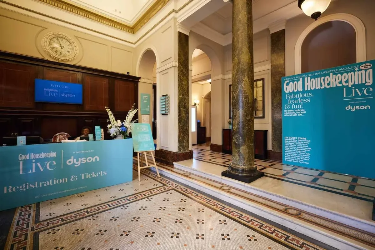Good Housekeeping brand event entrance with floral installations