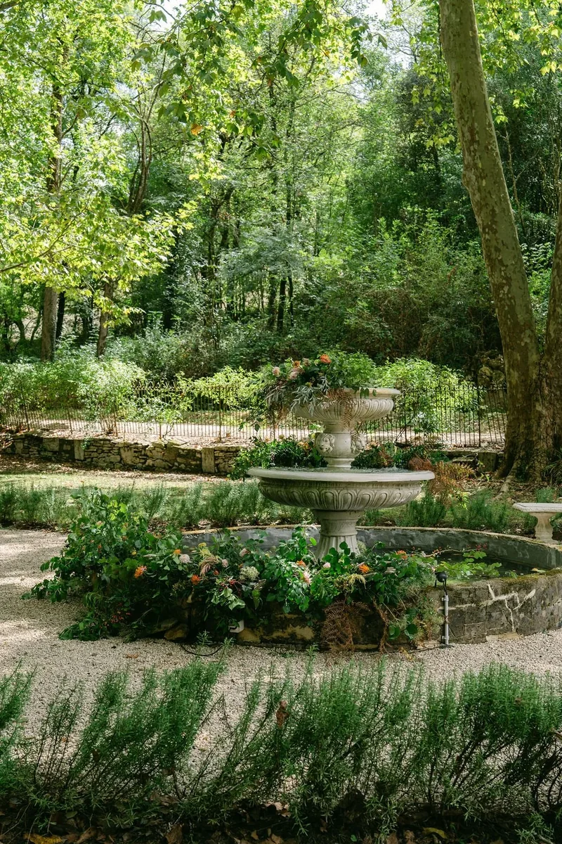 Formal garden planted with colourful wedding flowers