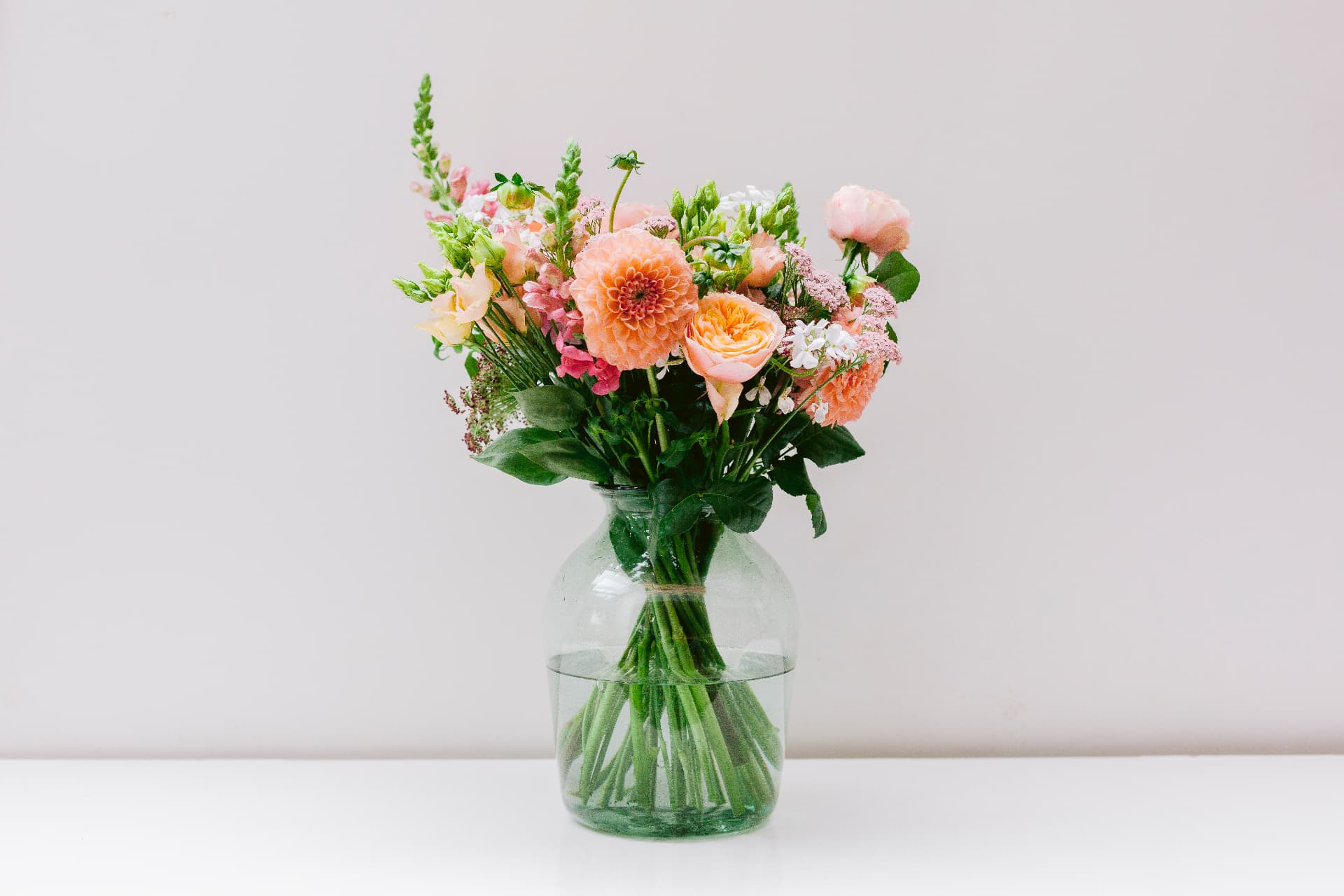 Bramble & Willow bouquet of peach dahlias, garden roses and snapdragons