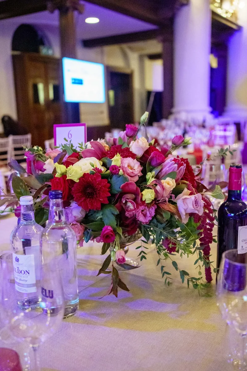 Pink and red awards dinner centrepiece